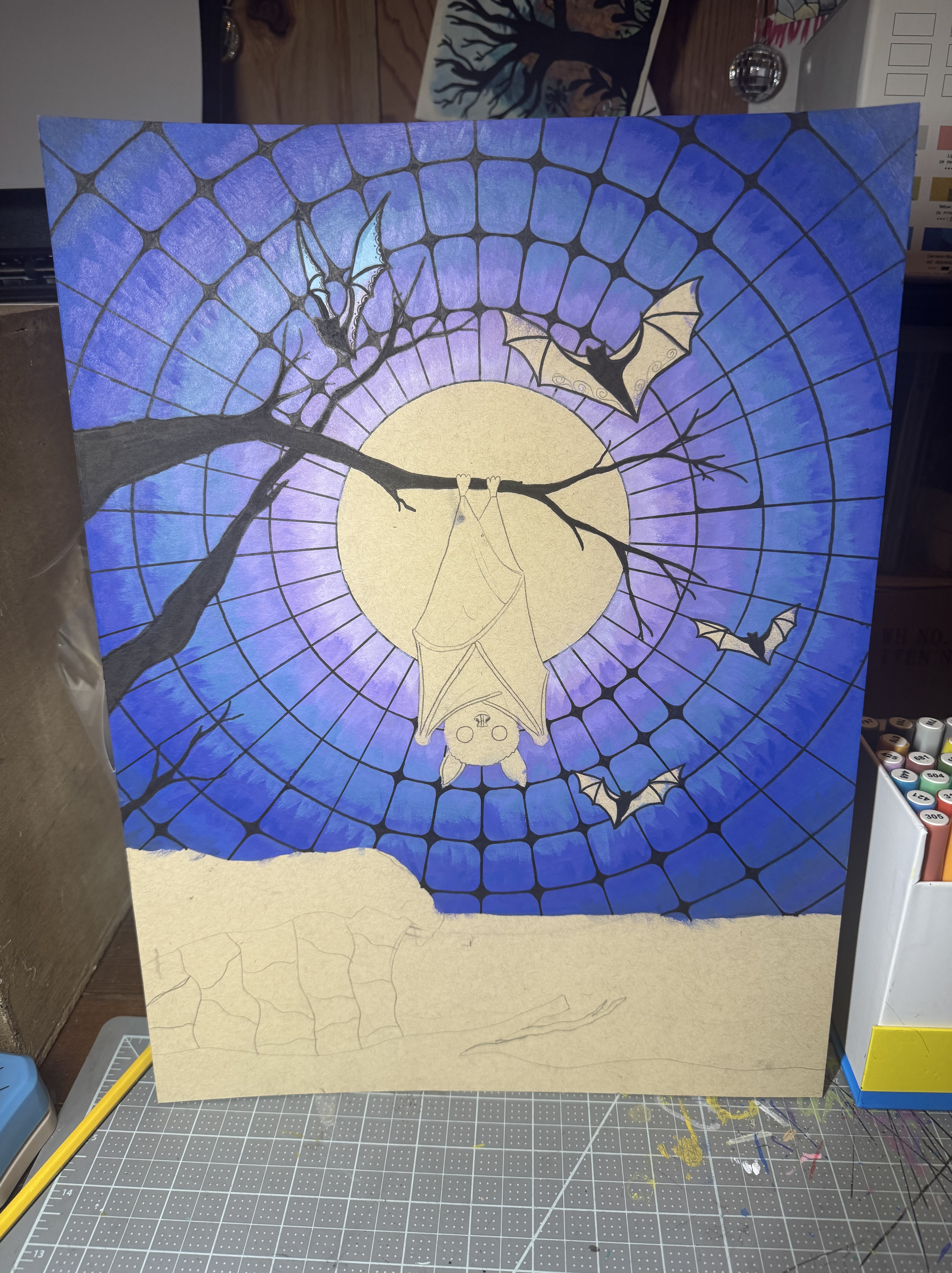 Work in progress: a bat painting in blue and purple
